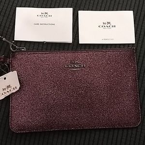 Coach glittery/metallic cherry glitter wristlet